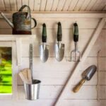 Where should I store my garden tools